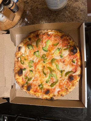 Cheese pizza with broccoli, peppers and onions