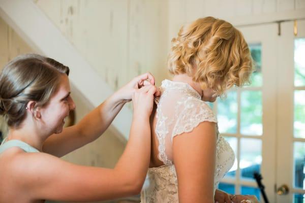 putting on the dress