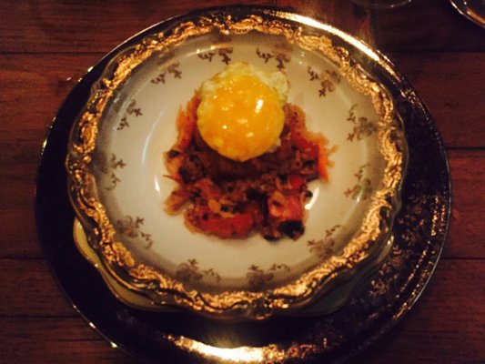 Fried rice with fish and egg yolk.