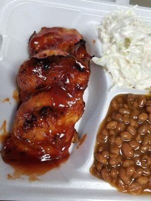 2 chicken thighs with baked beans and coleslaw ($13)