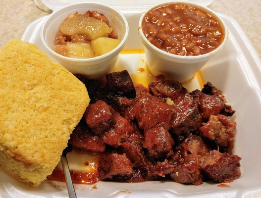 Really solid BBQ! Apple stuffing, baked beans, burnt ends and a gold brick of perfect cornbread.