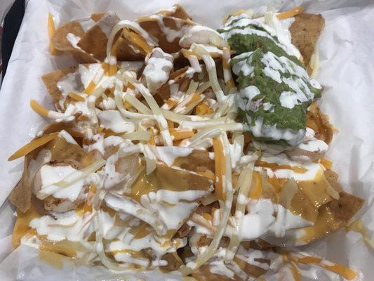 9.4.19 Grilled Shrimp Chips with Nacho Cheese, Guacamole, sour cream and shredded cheese