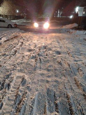 Parking lot not plowed and cars getting stuck