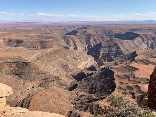 My favorite spot at Muley Point. Although it was impossible (and frustrating) to get myself into photos, this view were beautiful.