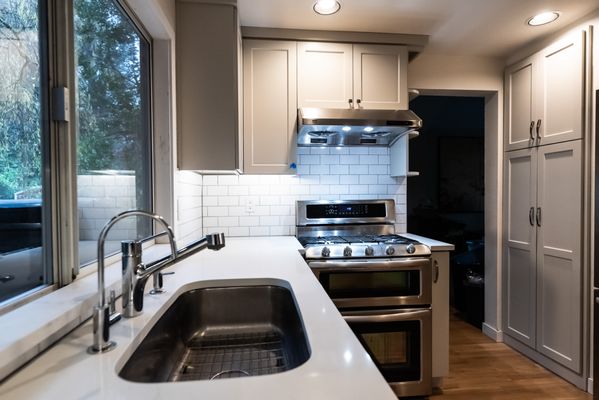 Deep sink installation, filtered water installation in kitchen remodel by North Seattle Handyman