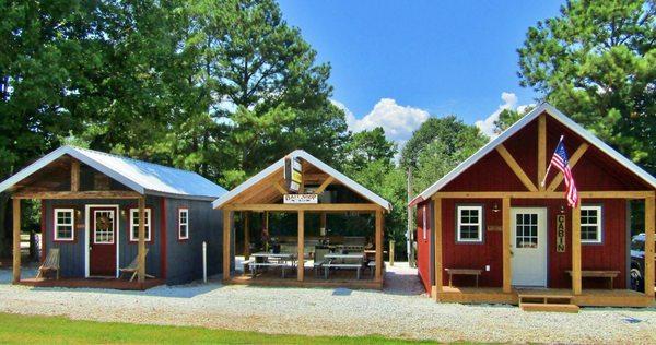 The two cabins with the shared outdoor kitchen.