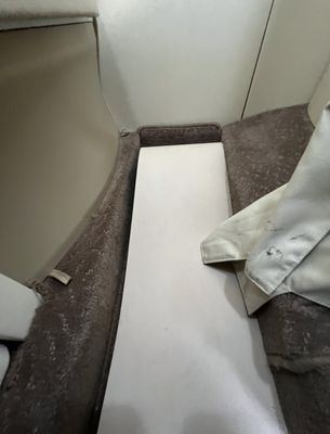 Jetit Hondajet bathroom condition with cardboard on the floor they put to try and cover the stains