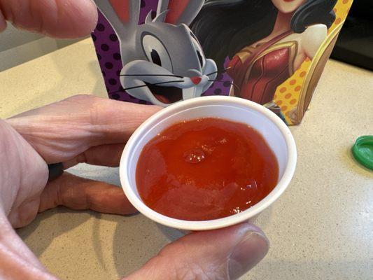 Whatever is coming out the ketchup spout is not ketchup or catsup... tastes either watered down and sort of funky.