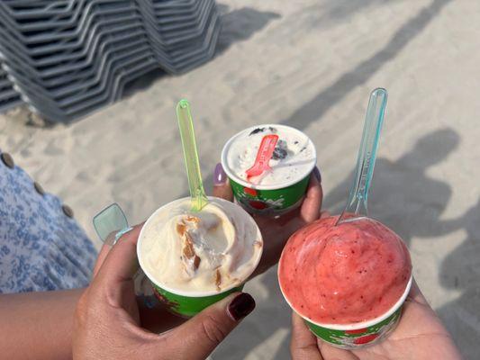 Dulce de leche, cookies and creme and strawberry gelato.