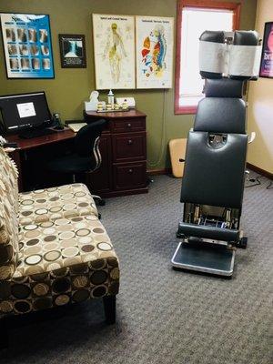 Exam room equipped with a Zenith High-Low table that works wonderfully for those who have a hard time getting onto/ laying down on a table.