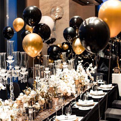 Table setting with balloons and flowers