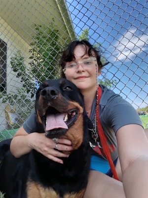 Remy enjoying time with one of her caregivers!