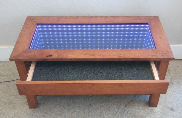 Infinity Table with hidden drawer