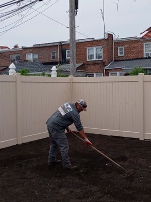 Preparing ground to sow grass