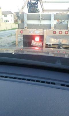 This truck made an illegal right turn to get on the Freeway at Durham in Fremont. He turned around  the island instead of getting in line