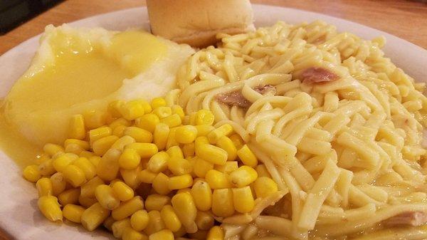 One of the specials. Chicken and noodles, potatoes and gravy, corn and roll.