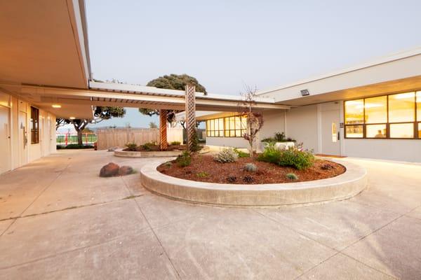 Landscaped Courtyard can be used for cocktail hours, registration table, setc