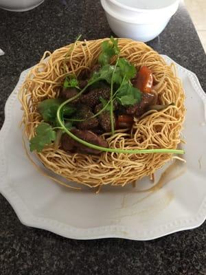 Fried noodle with Luc Lac Beef, include a bowl of clear broth