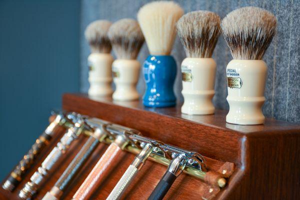 Proper shaving gear... Outstanding assortment of badger and synthetic shaving brushes. Presented with a variety of safety razors.