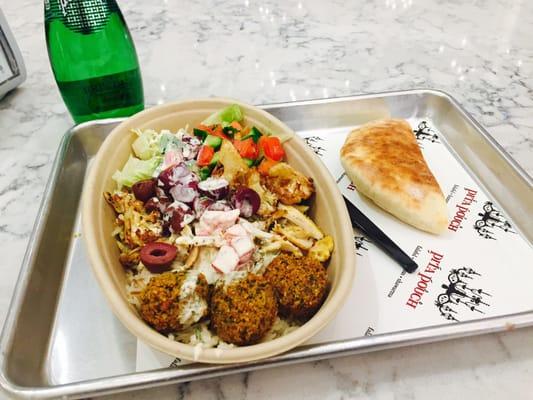 bowl with chicken shawarma and falafel + fresh pita on the side!