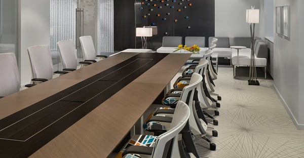 Stylish confrence room table with leather conference seating.