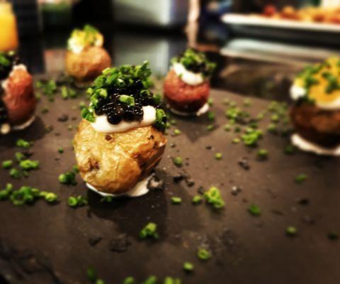 Baked Fingerling Potato, sturgeon Caviar, smoked creme fraiche, chives, black maldon salt.