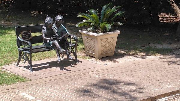 Here is a nice sculpture near the library entrance and some of H-town's varied vegetation ... in a planter.