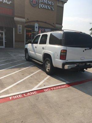 The Jimmy Johns delivery vehicle once again ILLEGALLY parking in the handicapped spot in front of their own restaurant!!