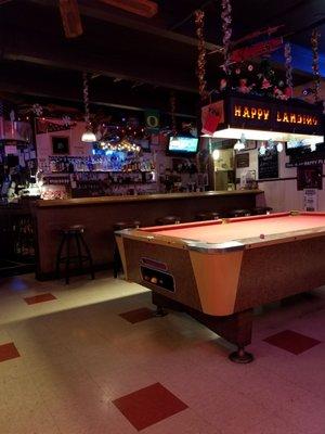 Bar and pool table.