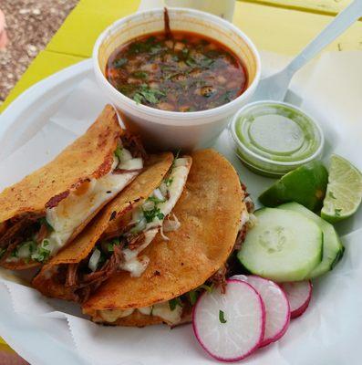 Quesabirria taco plate with consome.