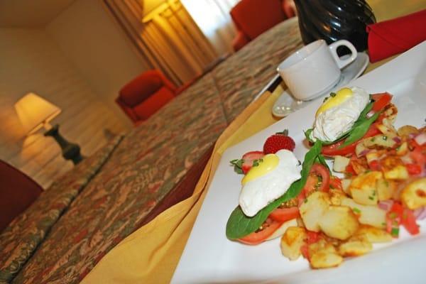 Eggs Benedict served in the convenience of your room