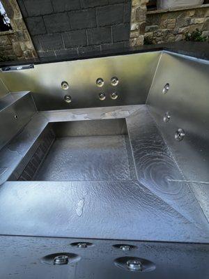 Stainless steel spa with hydro therapy from Enduring Pools