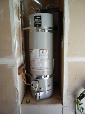 Install new 40 gallon water heater and new hot and cold supply line and gas flex line