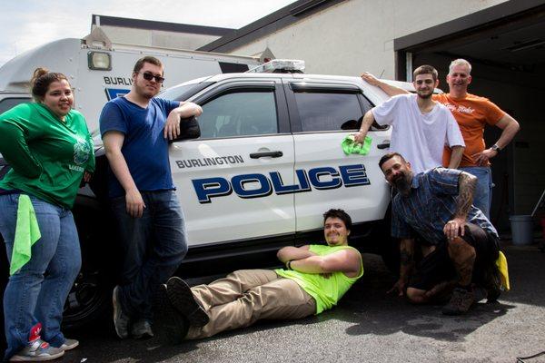 Working on Burlington Police Department cars.