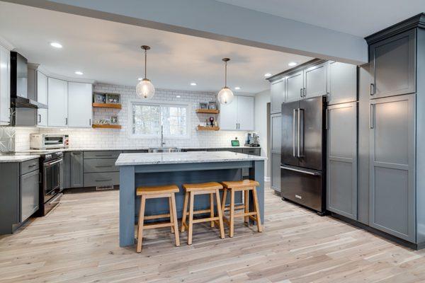 Grey base cabinets with White wall cabinets.