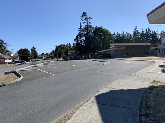 Bus area and parking by the main entrance.