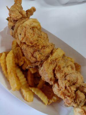 Chicken on a stick w/ seasoned crinkle fries