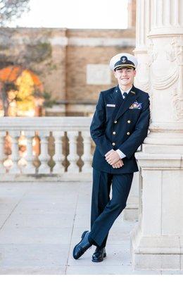 High School Senior guy wearing ROTC uniform during senior session during Senior session on Texas Tech University  campus