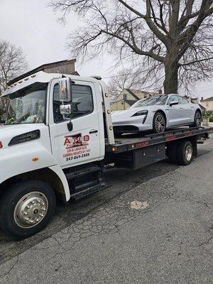 Porsche with flat tire