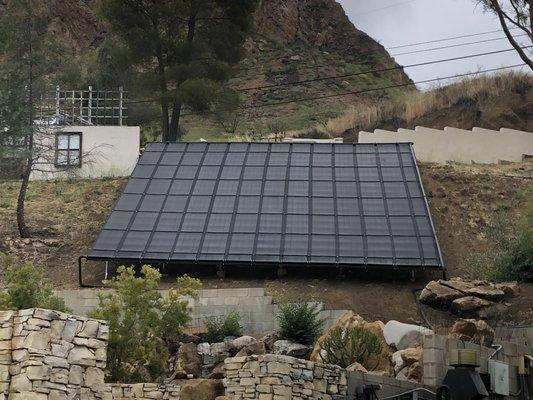 Installation of the new pool solar system on a custom deck we built.