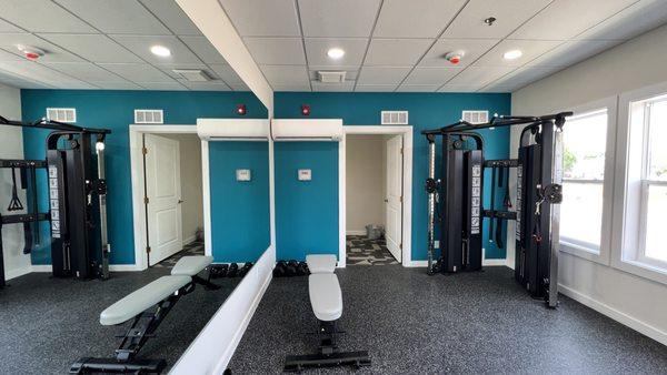 Fitness center at Cinema Apartments.