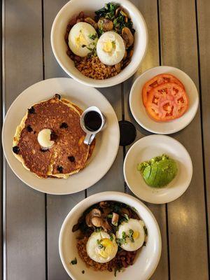 Grains, greens, & beans (bowls), short stack griddlecakes, side of avocado, and side of tomatoes