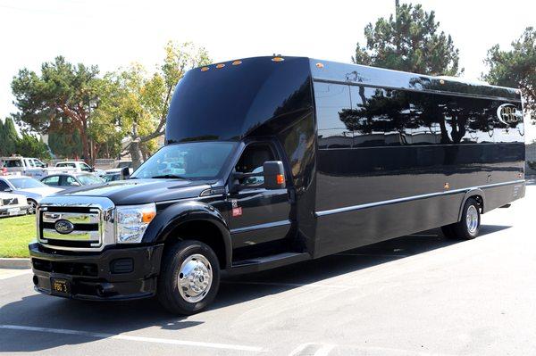 Our Legend Party Bus is the perfect transportation, with a large bar, wrap around leather seating, 4 flat scree TV's and even a dance pole