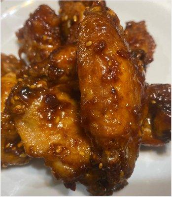 Tong Fried Chicken wings Regular / Spicy. Thai style chicken wings. Tossed in our Chili-Tamarind Wing Sauce. (7) $9