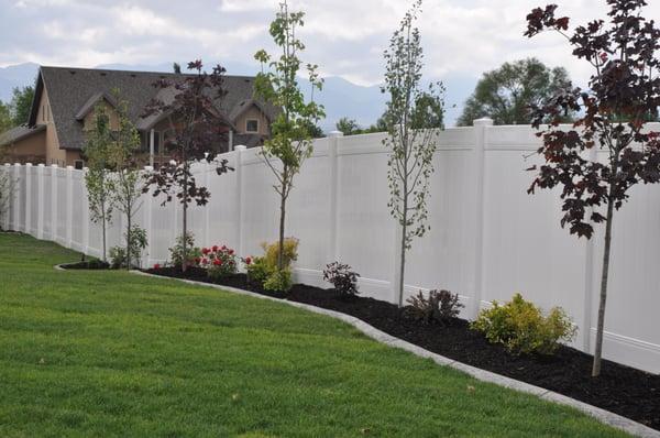 "HIGH WIND" fence by Crown Vinyl