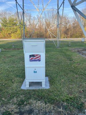 Flag Collection Box- a complimentary service to properly dispose of both USA and state flags. Located under the power line on Ford Road.