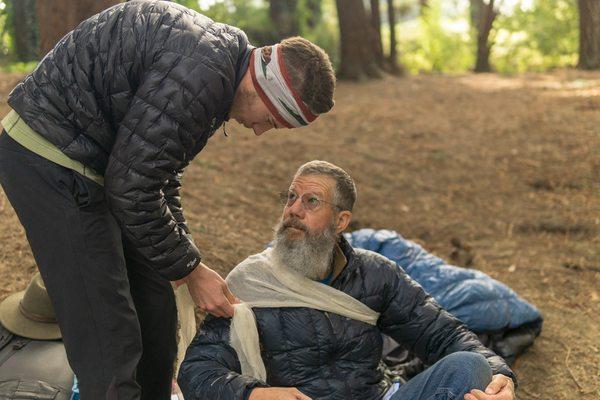 Practicing bandaging and dressing during a With The Wild Things Wilderness First Aid Class