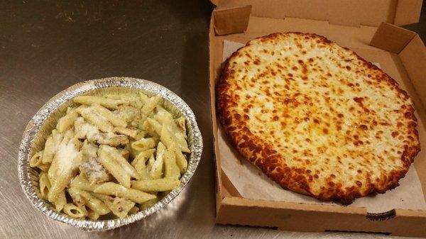 Chicken pesto with penne and mushrooms, with a side cheesestix  , great pasta i will order that again