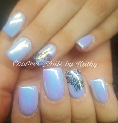 Hard gel overlay with a chrome and stamped design.