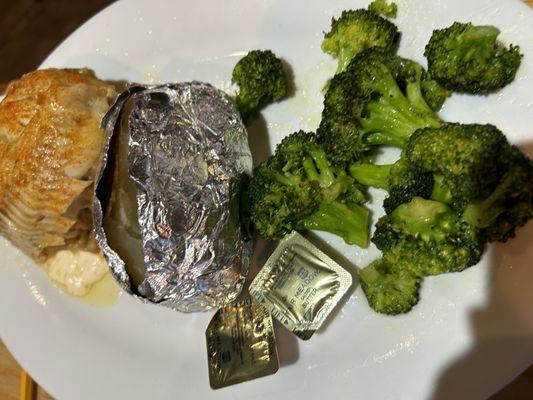 Fish, baked potato and broccoli. Delicious.